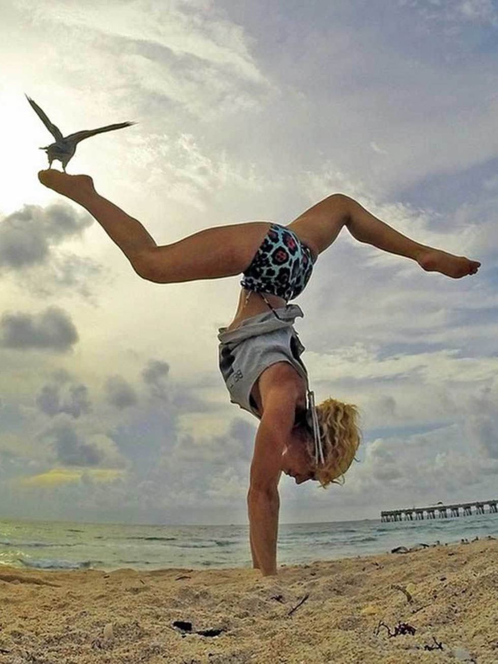 <p><a href="https://instagram.com/beachyogagirl/">@beachyogagirl</a> aka Dream Lifestyle Yogi</p>

<p>Kerri Verna lives by the beach and posts daily, envy-inducing (not very yogi, we know. We're working on it) snaps of everything from acro yoga to handsta