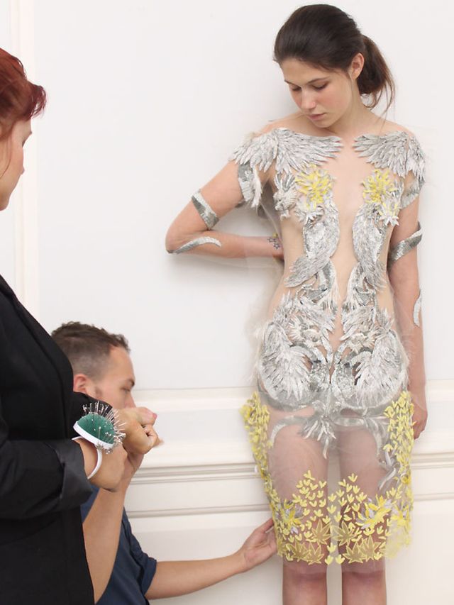 <p>Model being fitted at Julien Macdonald studio</p>