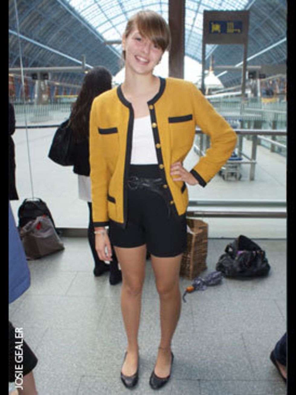 <p>Sarah Crawford, Student, wears vintage Chanel jacket, Moschino trousers, and Steve Madden shoes.</p>