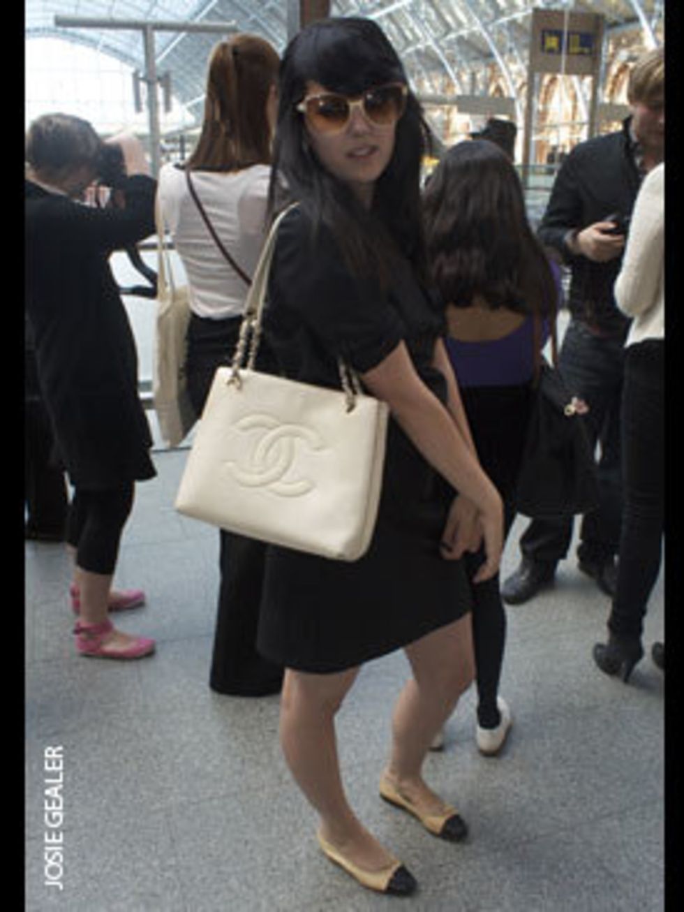 <p>Alexandra Hicks, fur dealer, wears Gap dress, Fendi sunglasses, and Chanel bag and shoes.</p>