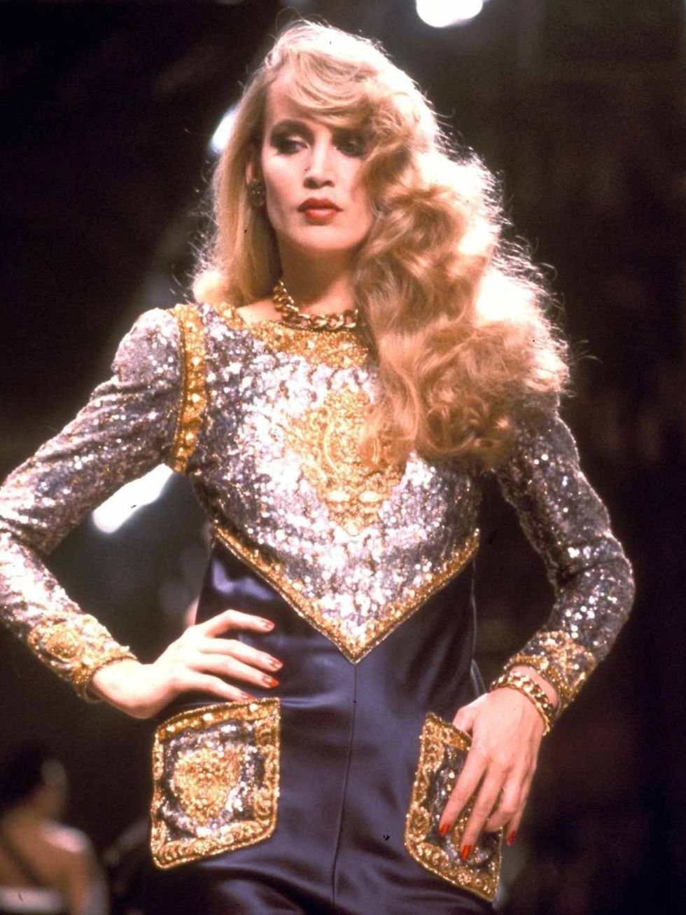 <p>Jerry Hall modelling a sequined dress</p>