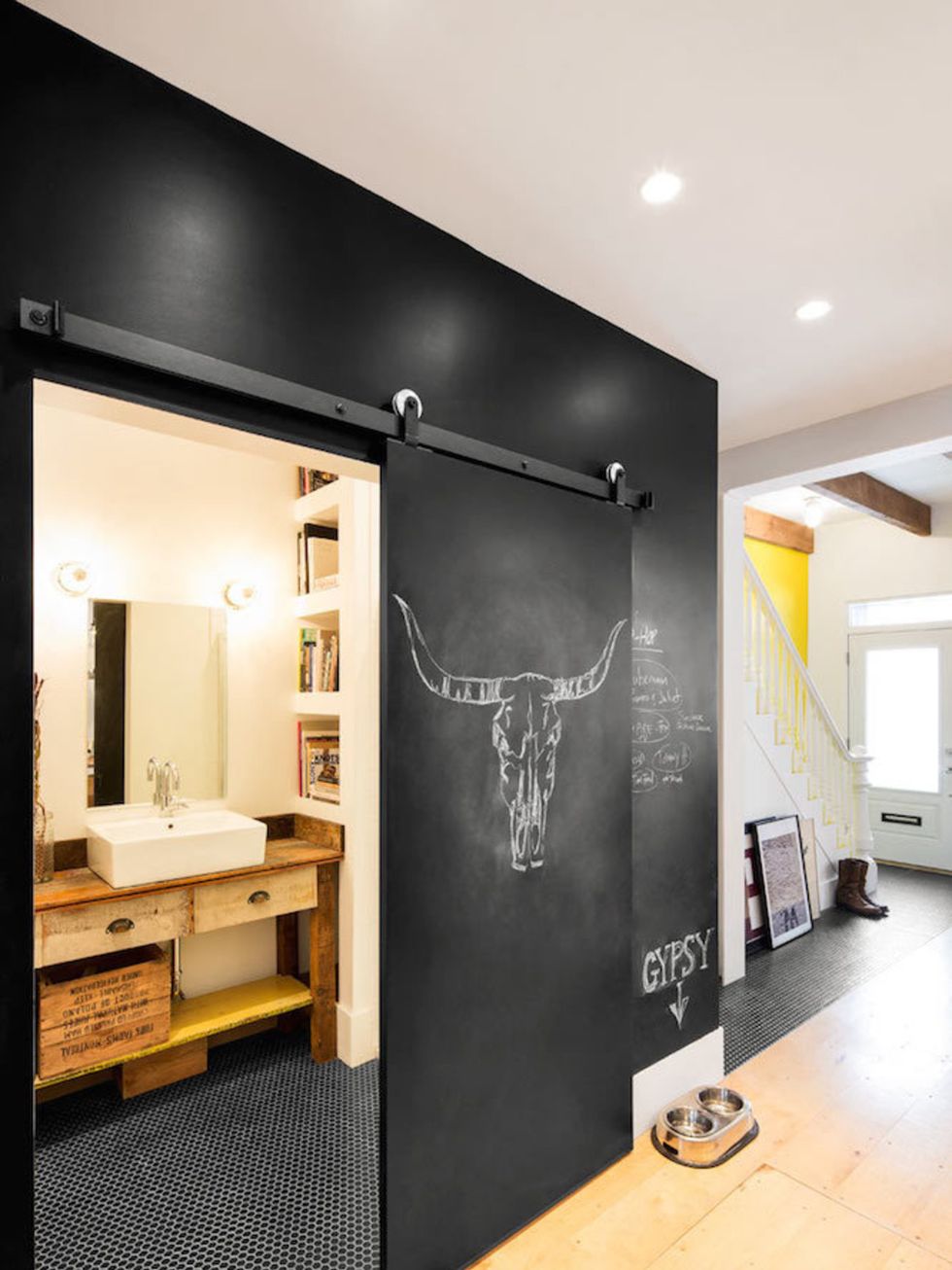 <p>For a cooler, younger design, how about a chalkboard wall? -<a href="http://design-milk.com/historical-row-house-gets-whimsical-industrial-renovation/grand-truck-revival-row-house-markvivi-8/" target="_blank">Design-Milk</a></p>