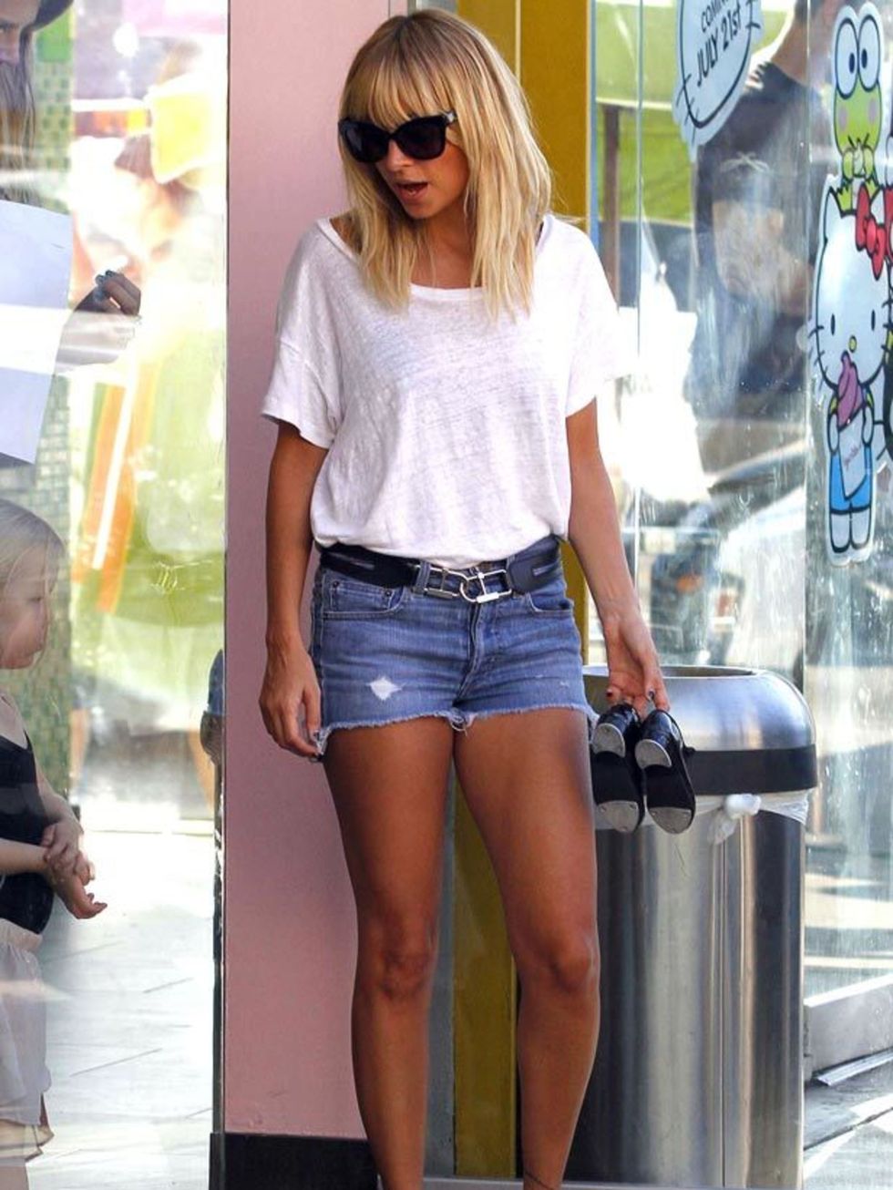 <p><a href="http://www.elleuk.com/starstyle/style-files/(section)/nicole-richie">Nicole Richie</a> works an off-duty LA look in a jersey tee teamed with denim shorts &amp; Giacomorelli loafers, October 2011</p>