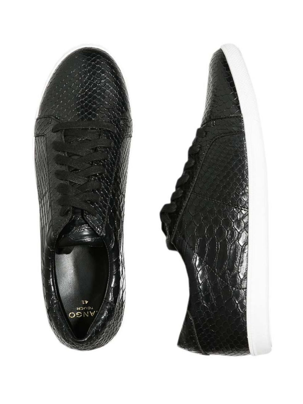 <p>Trainers you could wear out for cocktails. Go on then, make ours a Negroni...</p>

<p> </p>

<p><a href="http://shop.mango.com/GB/p0/women/accessories/shoes/faux-leather-sneakers/?id=33083678_02&n=1&s=accesorios.zapatos&ident=0__0_1413824783028&ts=1413