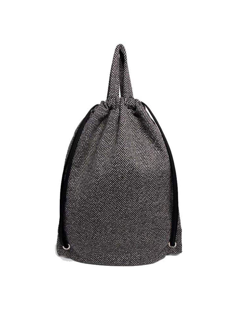 <p><a href="http://www.asos.com/asos/asos-tweed-drawstring-backpack/prod/pgeproduct.aspx?iid=4255261&clr=Grey&SearchQuery=tweed&pgesize=36&pge=1&totalstyles=53&gridsize=3&gridrow=2&gridcolumn=2" target="_blank">Asos bag</a>, £18</p>