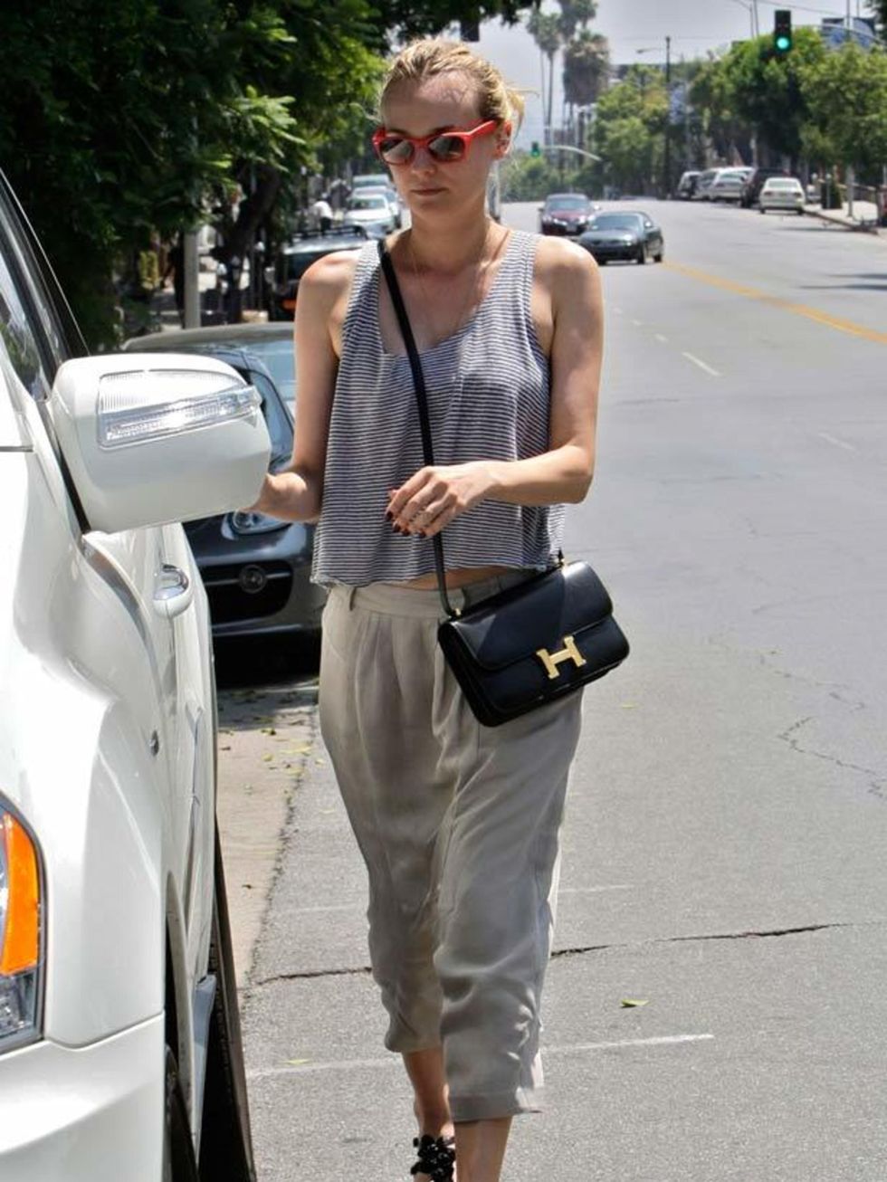 <p><a href="http://www.elleuk.com/starstyle/style-files/(section)/diane-kruger">Diane Kruger</a> dressing up her downtime look with a <a href="http://www.elleuk.com/catwalk/collections/hermes">Hermes</a> cross-body bag</p>