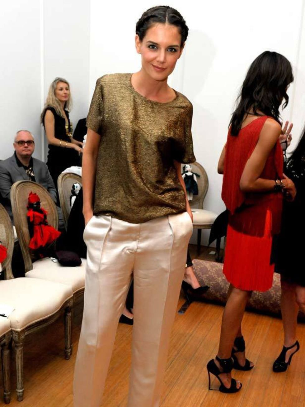 <p><a href="http://www.elleuk.com/starstyle/style-files/(section)/Katie-Holmes">Katie Holmes</a> teams her <a href="http://www.elleuk.com/catwalk/collections/lanvin/">Lanvin</a> top with her silk trousers at the Rendez Vous with Alber Elbaz at Carondele