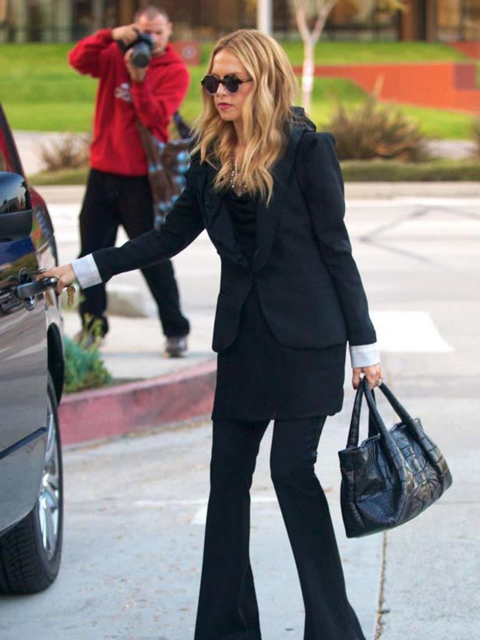 <p><a href="http://www.elleuk.com/content/search?SearchText=rachel+zoe&amp;SearchButton=Search">Rachel Zoe</a> wears a suit from her own collection out &amp; about in LA, November 2011</p>