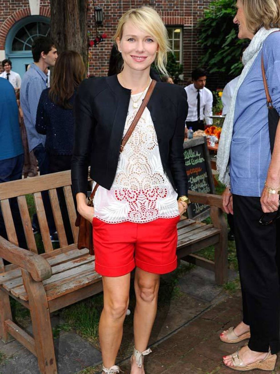<p><a href="http://www.elleuk.com/content/search?SearchText=Naomi+Watts&amp;SearchButton=Search">Naomi Watts</a> pairing a pair of bright red shorts with a lace top at the <a href="http://www.elleuk.com/catwalk/collections/stella-mccartney">Stella McCartn