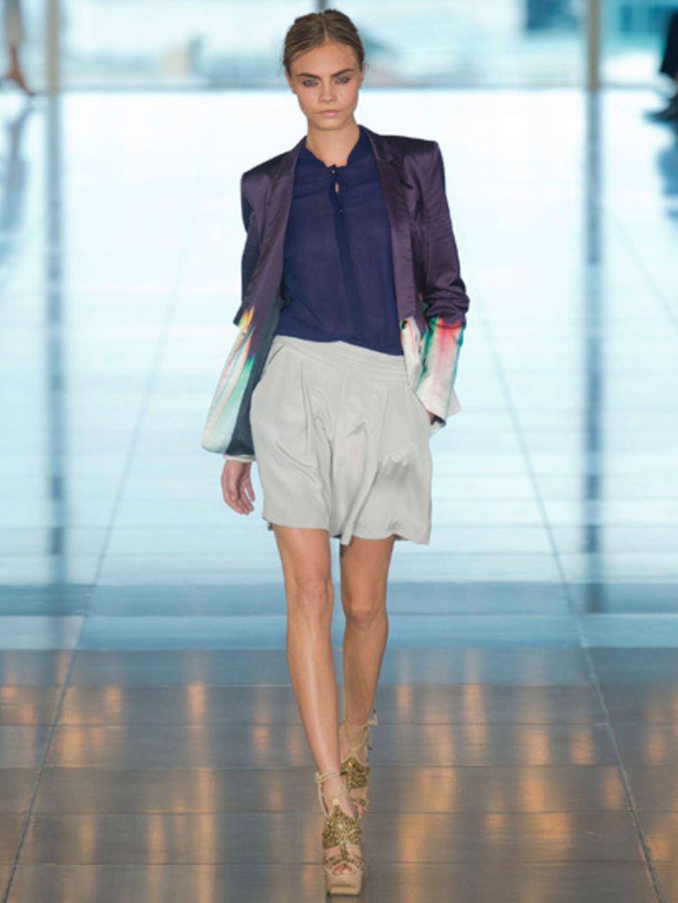 <p>A model takes to the catwalk at the Matthew Williamson SS13 show</p>