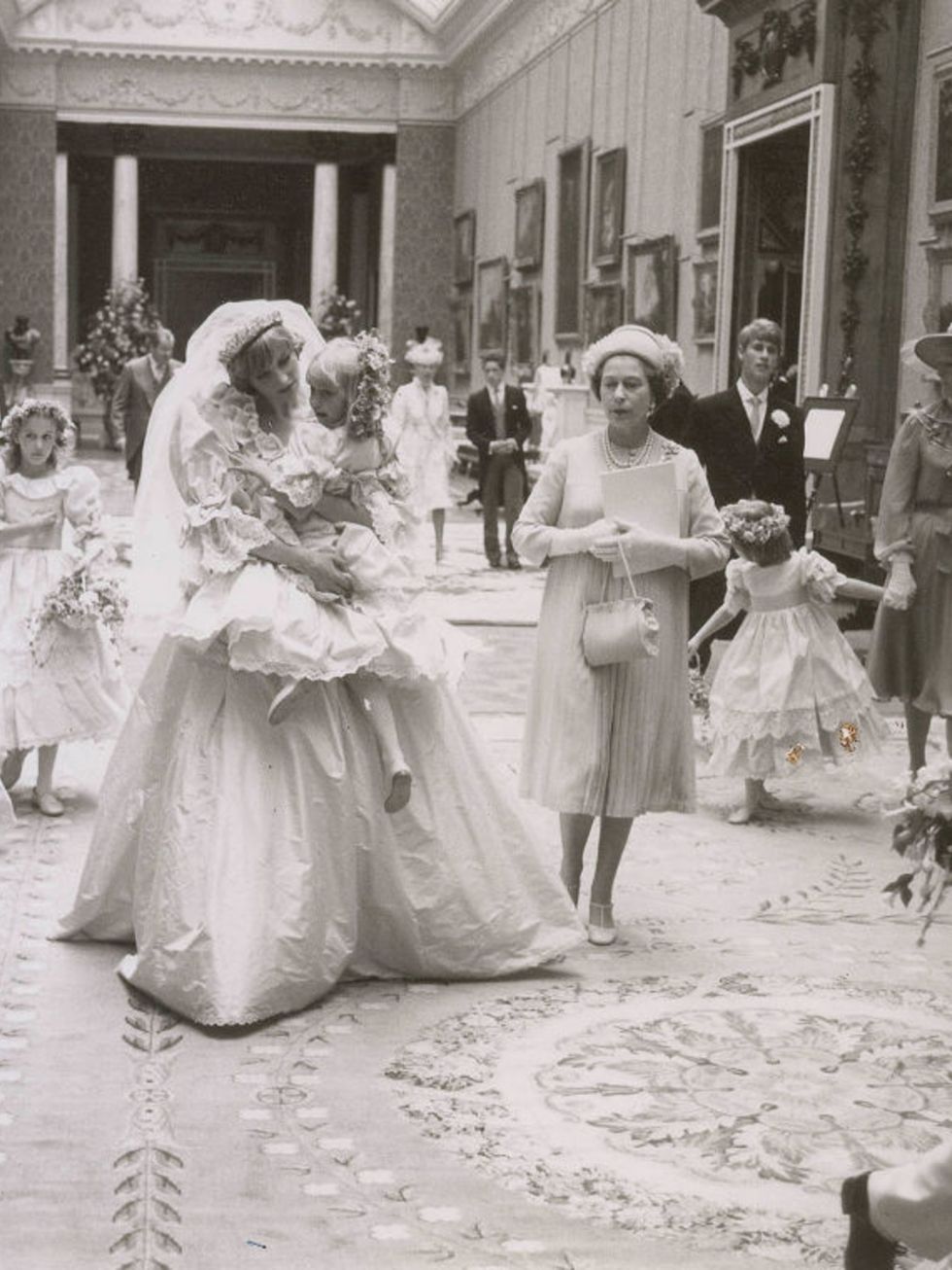 Princess Diana carries Hambro alongside Queen Elizabeth; Princess Margaret's daughter, Sarah Armstrong Jones, walks behind them