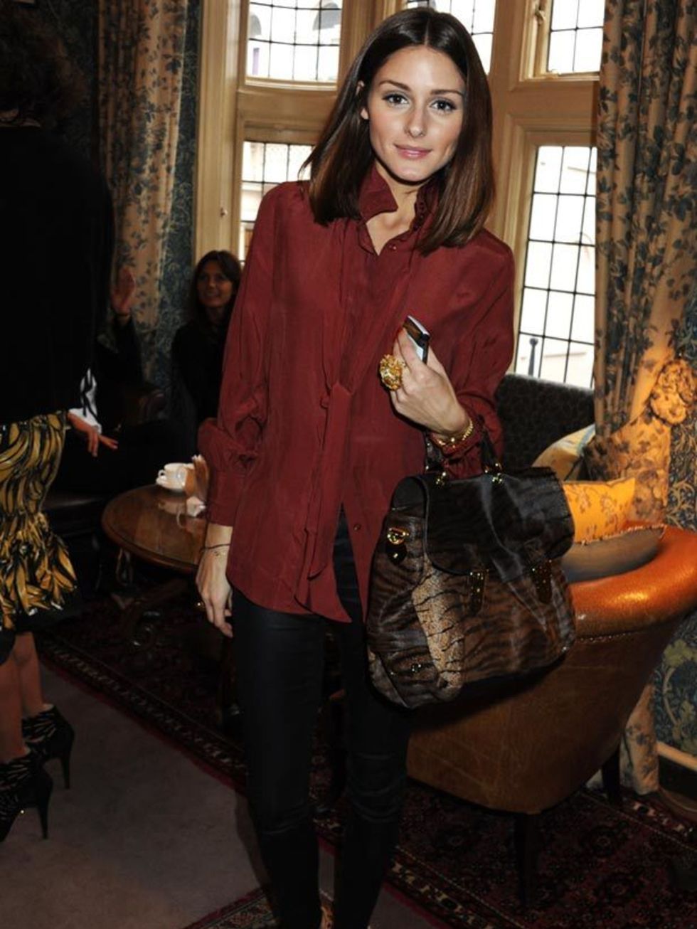 <p><a href="http://www.elleuk.com/starstyle/style-files/%28section%29/olivia-palermo">Olivia Palermo</a> wearing a red Mango blouse with <a href="http://www.elleuk.com/news/Fashion-News/charlotte-olympia-s-brand-new-store">Charlotte Olympia</a> leopard pr