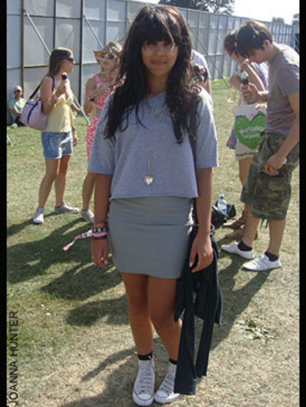 <p>Yasmin Uddin a 19 year old student from Chelmsford is wearing a customised T-shirt, Necklace from H&amp;M, Skirt from Topshop, Converse trainers and Bag from Accessorize.</p>