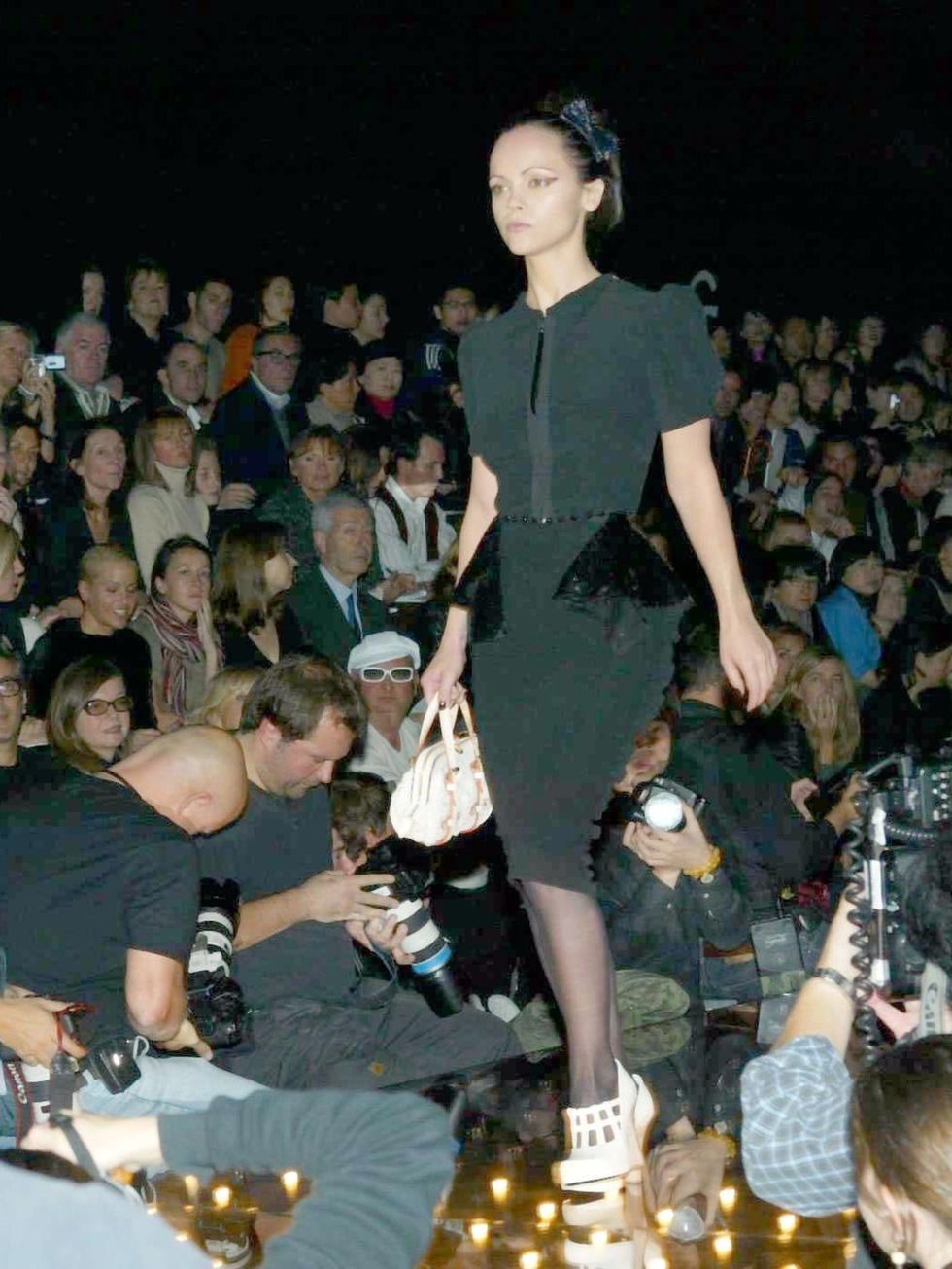 <p>Christina Ricci on the catwalk for Louis Vuitton Spring Summer 2005, Paris Fashion Week 2004.</p><p><a href="http://www.elleuk.com/star-style/celebrity-style-files/elle-celebrates-the-flamboyant-fashion-star"></a></p><p><a href="http://www.elleuk.com/c