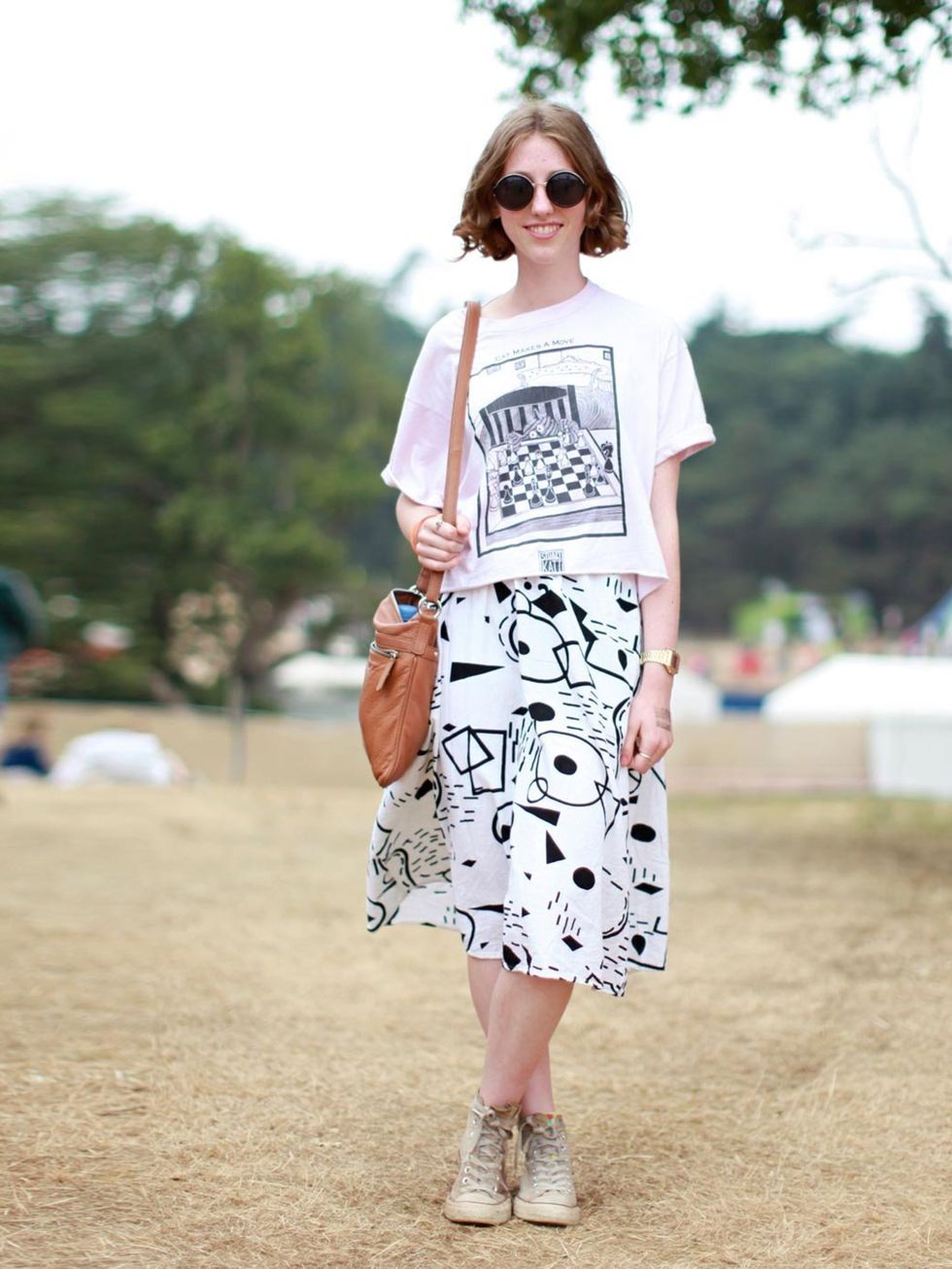 <p>Hanna Banks wears vintage t-shirt, Urban Outfitters skirt, with her Mum's bag and vintage sunglasses.</p>
