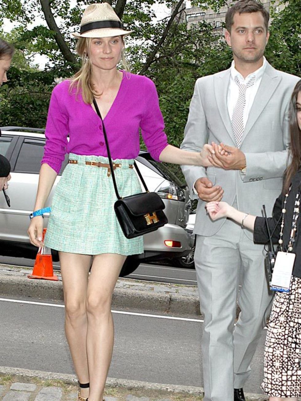 <p>Diane Kruger looking gorgeous in summer brights and a fedora </p>