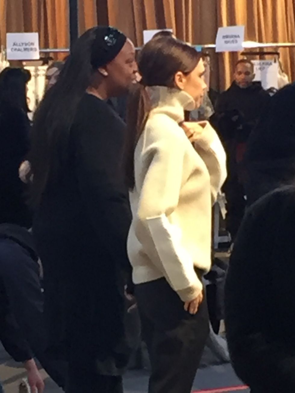 Victoria Beckham and Pat McGrath looking over the lineup. I like to think they're deciding which two girls are getting the hero deep red lip look.