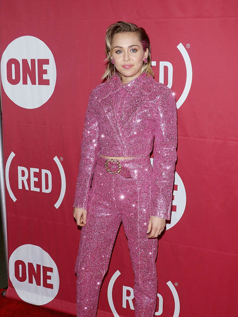 Miley Cyrus attends the One and (Red)'s concert to mark World Aids Day, December 2015