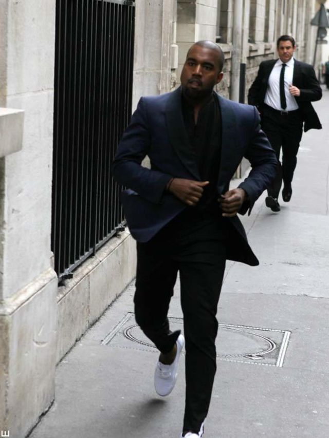 <p>Kanye West heading into the Azzedine Alaia show</p>