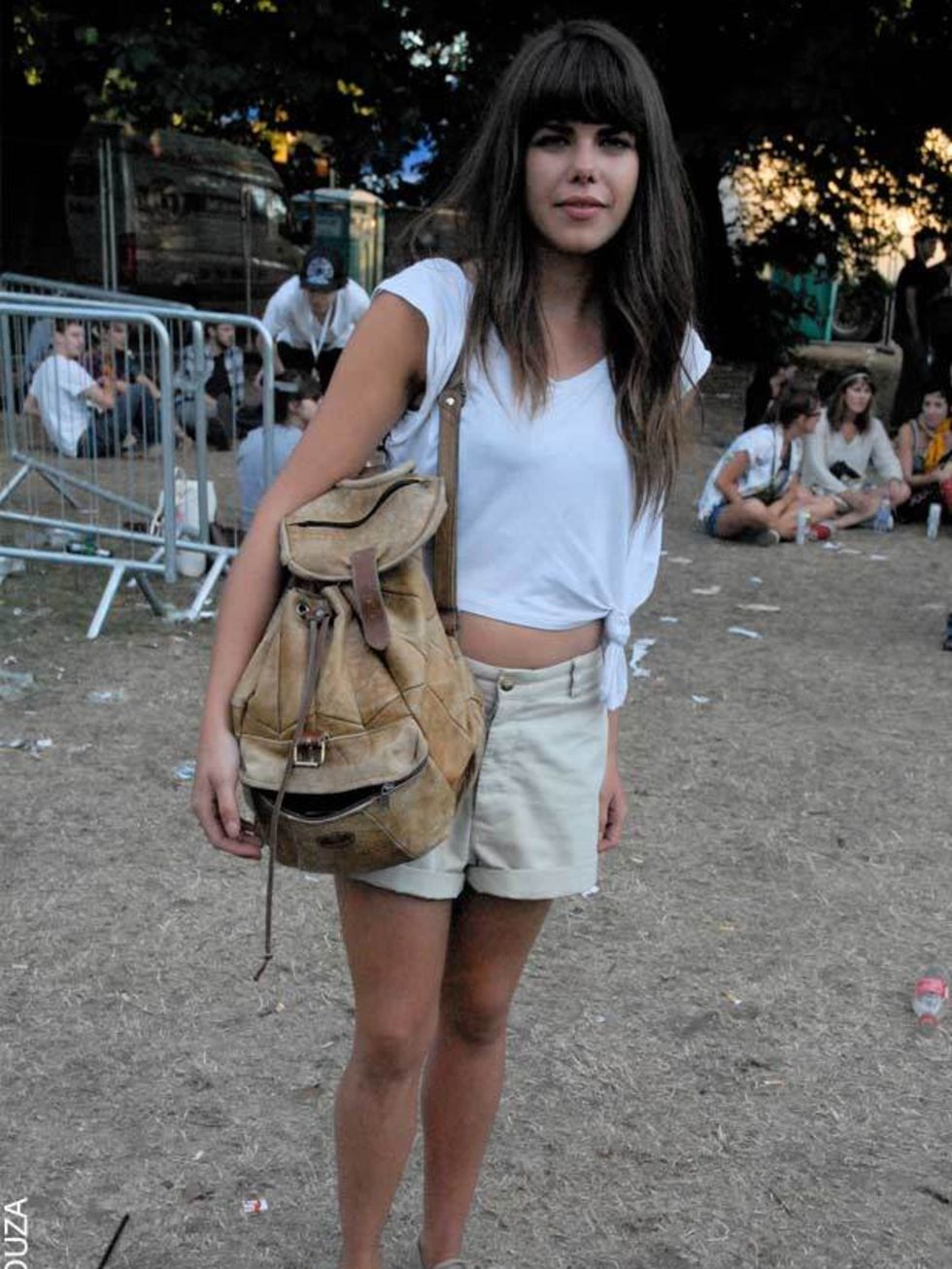 <p>Nicola Atkins, 24, Student. Vintage t-shirt, shorts and bag, Vans shoes.</p>