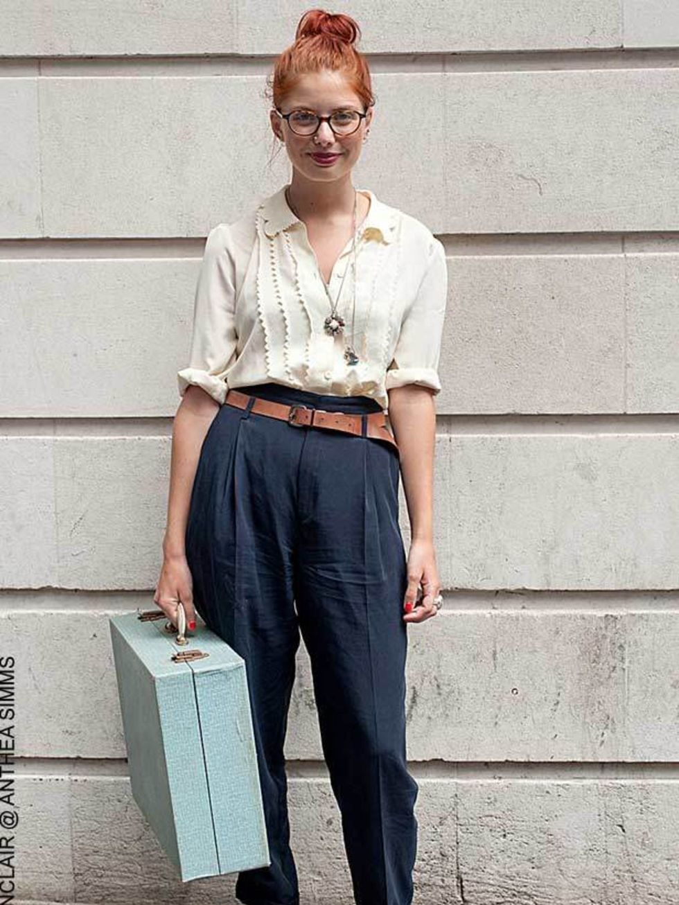 <p>Olivia, 19, Student. Blouse and picnic case vintage, belt and trousers by Zara, glasses by Ralph Lauren, shoes by Primark. </p>