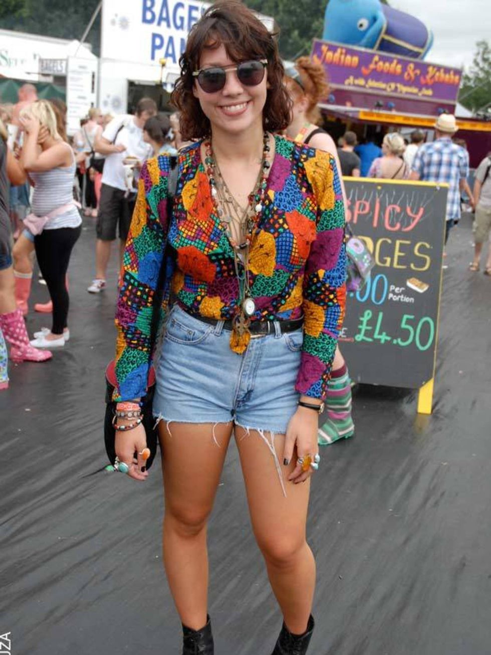 <p>Felicity, 19, Student. Vintage top, charity shop shorts and bag, Topshop vintage boots.</p>