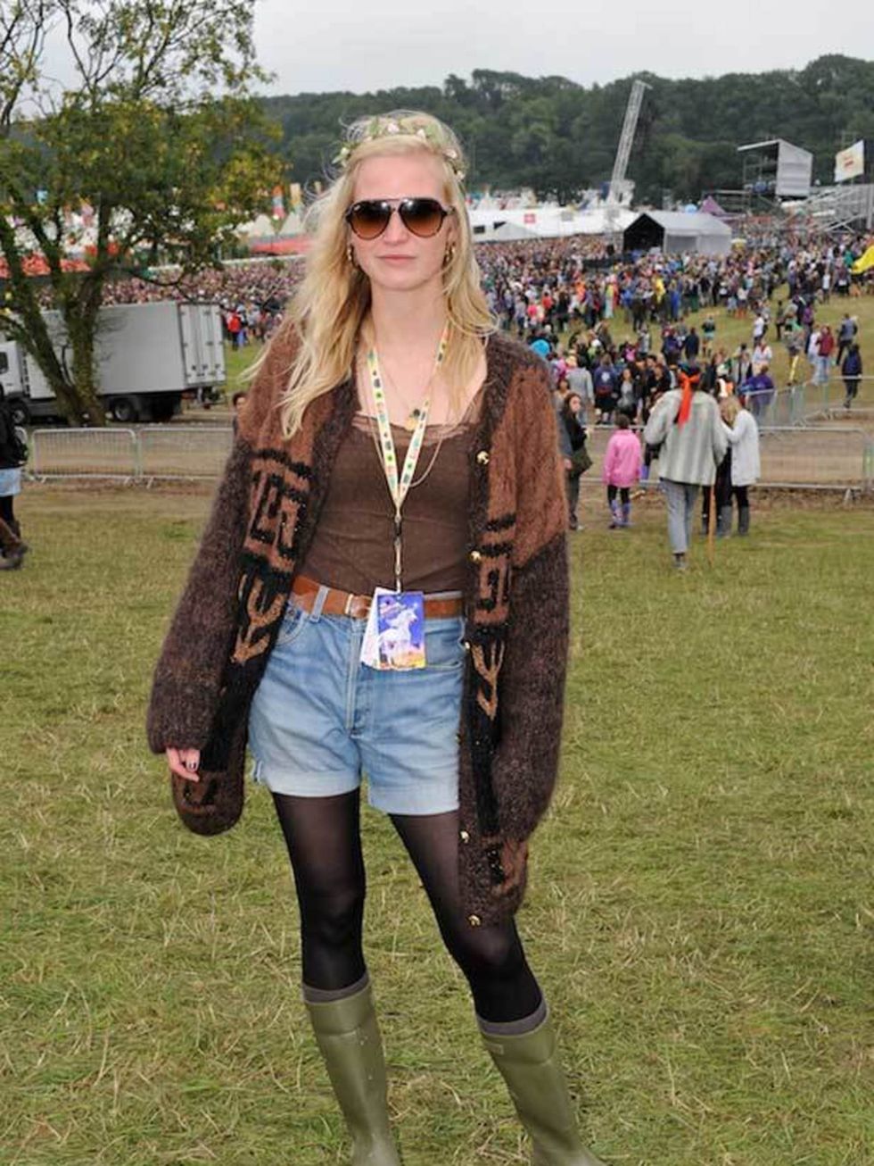 <p>Alice Davey, 21, Student. Rayban sunglasses, Vintage cardie, H&amp;M top, Levi shorts, Dunlop wellies.</p>
