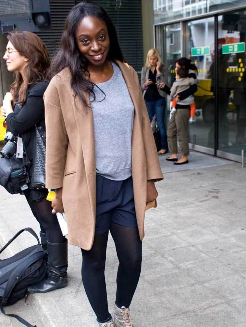 <p>Precilla Kwateng, 24, Stylist. Topshop coat, American Apparel top, Zara shorts, Rick Owen shoes. </p>