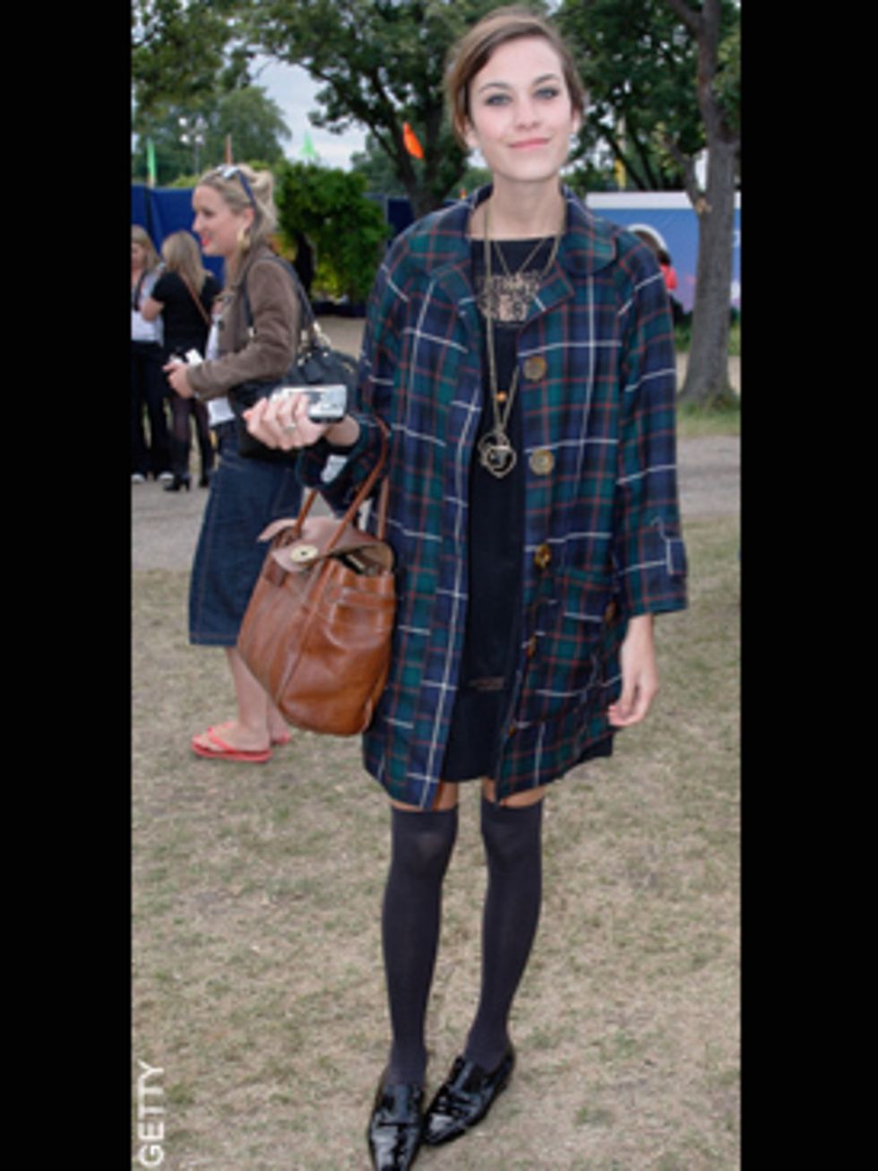 <p>Alexa Chung in the signature look she defined in 2008, granny meets school girl chic.</p>