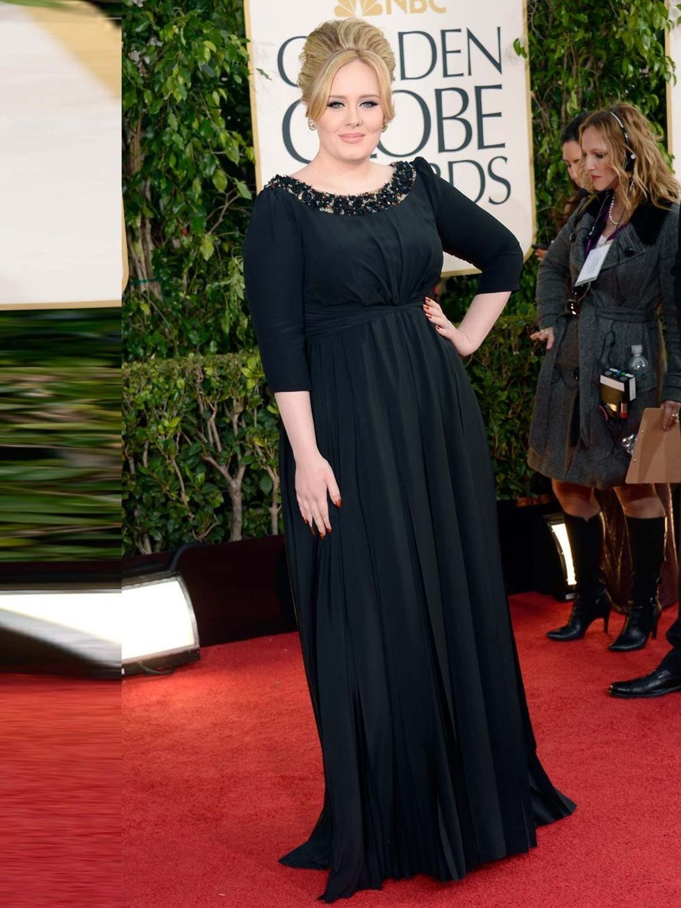 <p>Adele wore a black Burberry gown at the Golden Globe Awards 2013. </p>