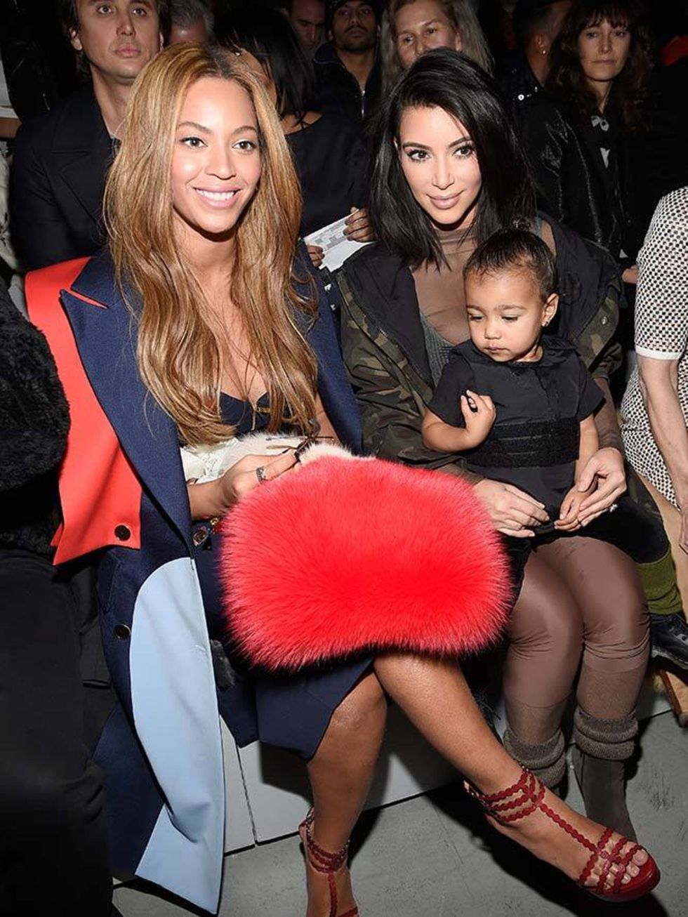 North West (with Beyoncé and Kim) at adidas x Yeezy AW15.
