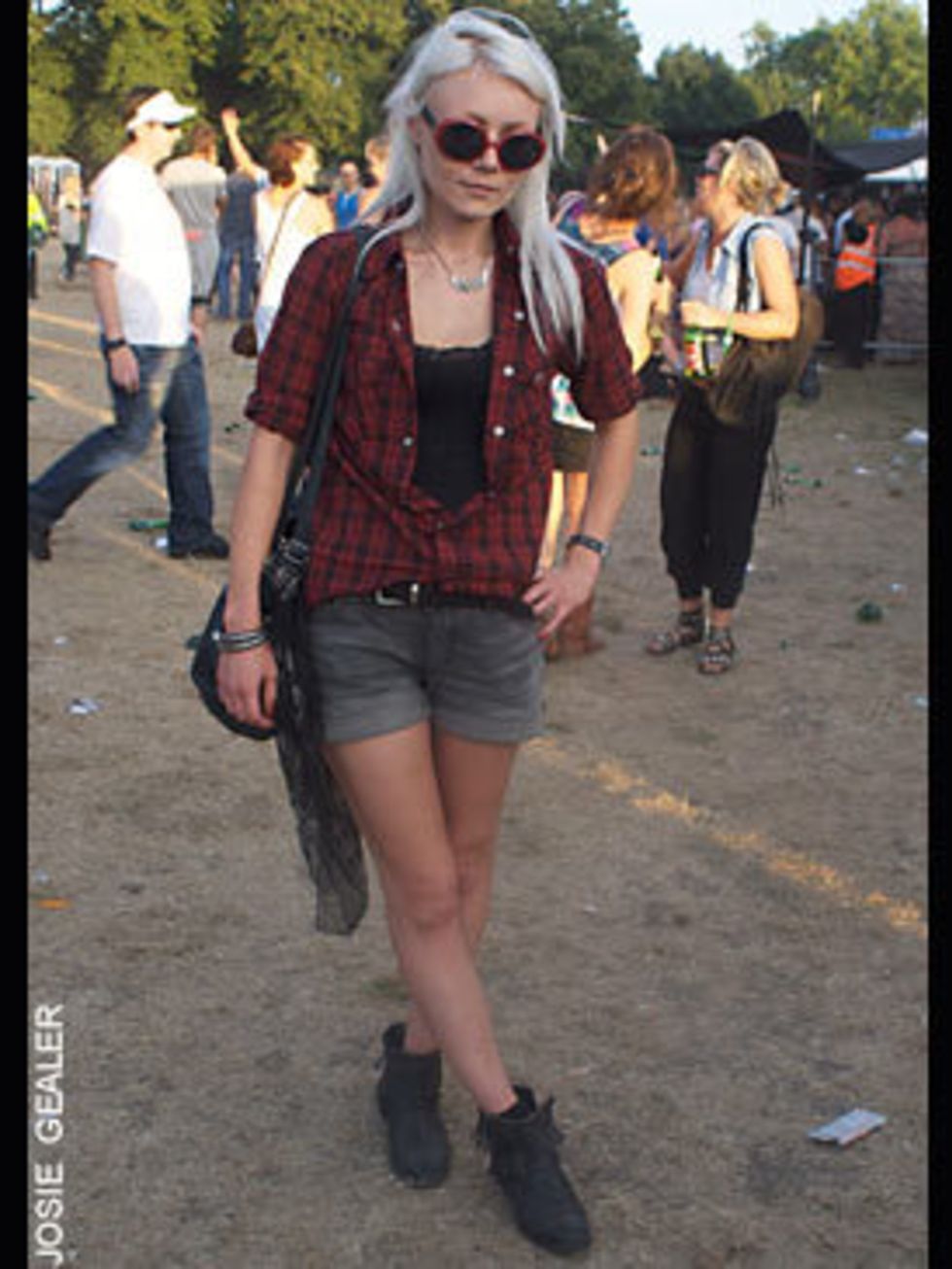 <p>Kara James, 25, an agents assistant is wearing her boyfriends shirt with shorts, vest and boots all from All Saints </p>
