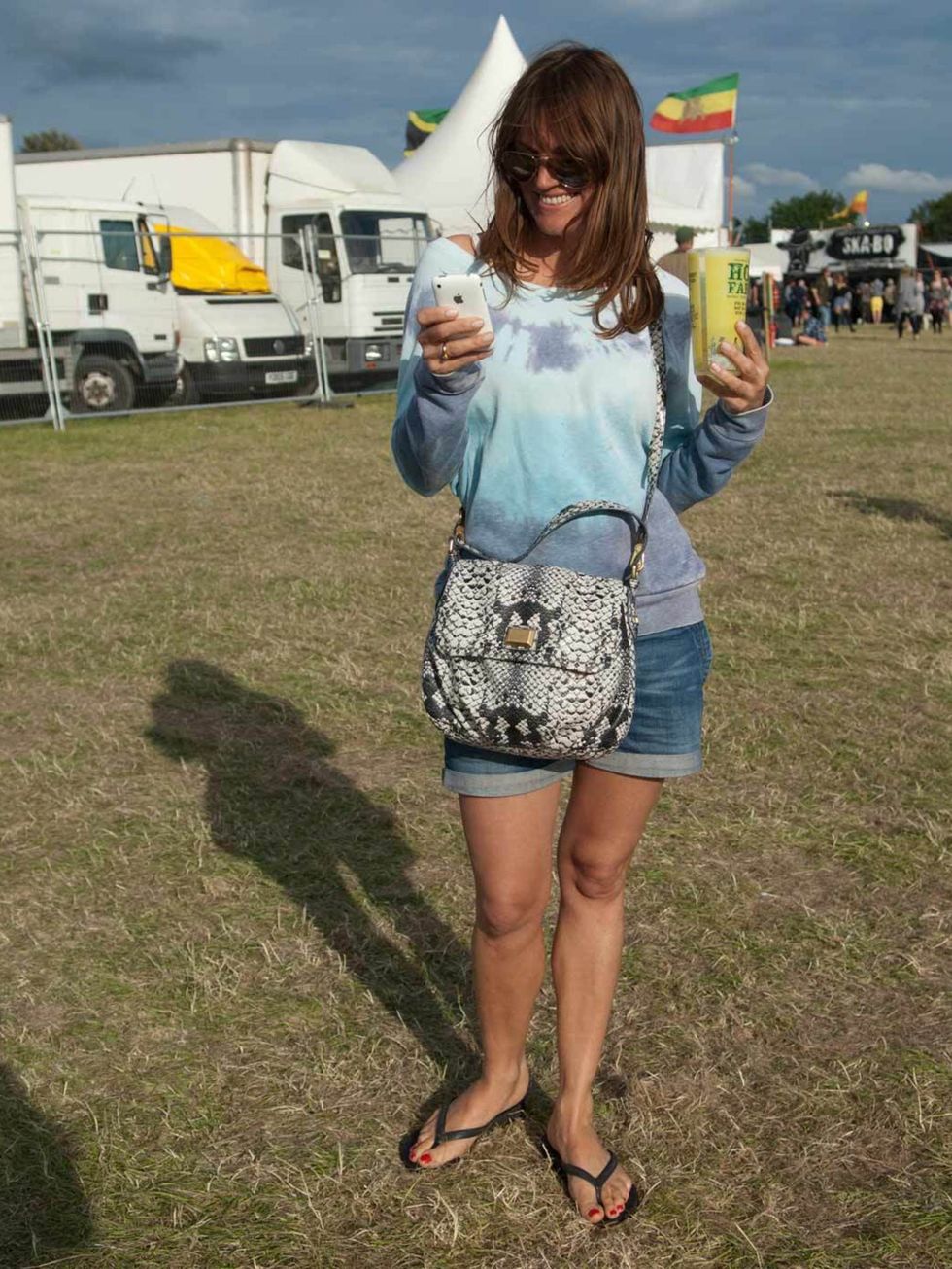 <p>Silvia, 42, fashion, London. Urban Outfitters jumper, Levi's shorts, Havaianas flip-flops, Marc by Marc Jacobs bag, Ray Ban sunglasses.</p>