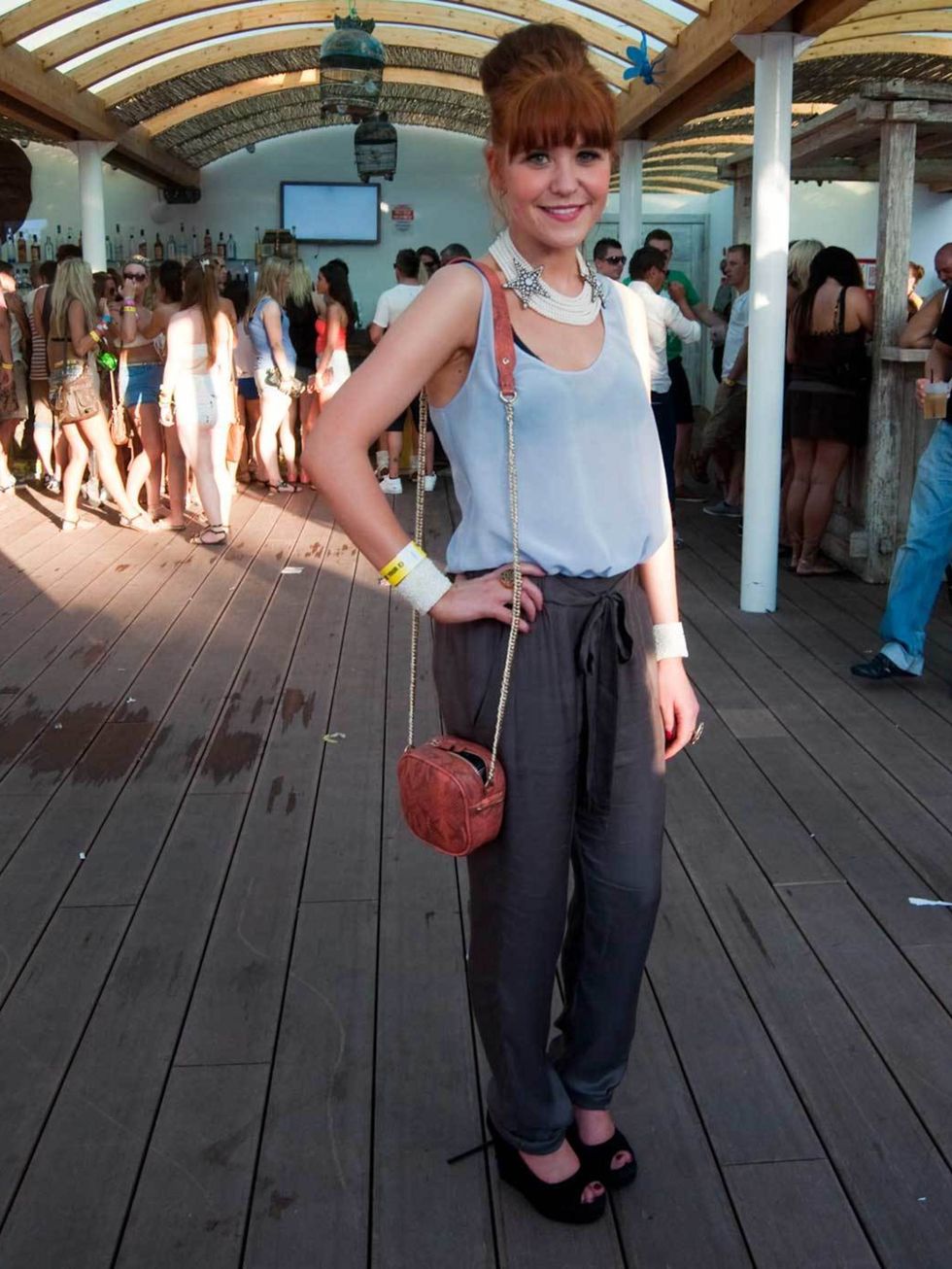<p>Pamila, 25, Manchester, PR. French Connection top and trousers, Topshop shoes, Marks &amp; Spencer bag, Mango necklace, Claudia Pink earrings and cuff, Beba and Accessorize rings.</p>