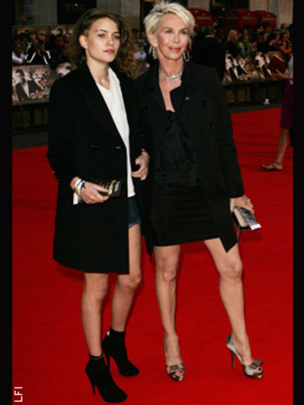 <p>Coco rocks the red carpet in micro mini denim shorts and a long length Tuxedo jacket, alongside mum Trudie Styler</p>