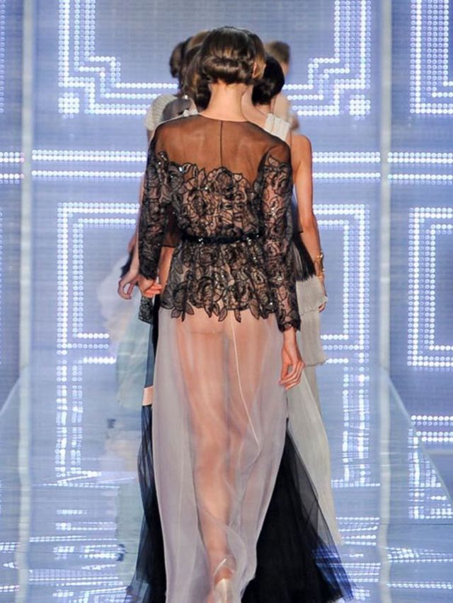 <p>Back view of Karlie Kloss closing the Dior S/S '12 show</p>