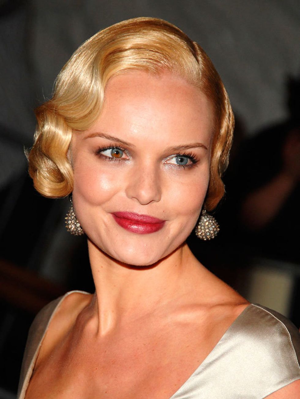 <p><a href="http://www.elleuk.com/star-style/celebrity-style-files/kate-bosworth-style-icons-best-dressed-moments">Kate Bosworth</a> goes all-out 1920s with her waved updo and stained wine lip. Notice how the lip has a worn-in feel? Recreate this with blo