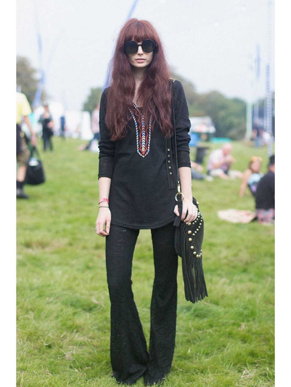 Emily Wood wears Vintage top and shoes, H&M trousers and Topshop bag.