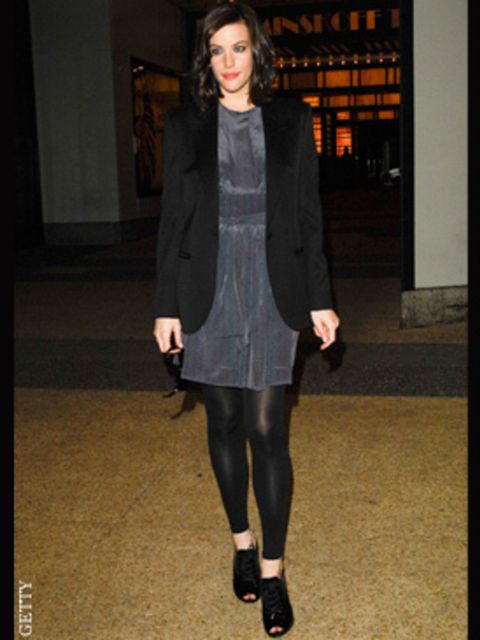 <p>Liv Tyler teams her Tuxedo jacket with a dress</p>