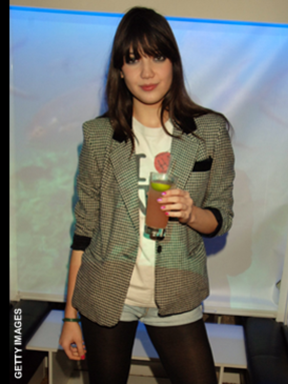 <p>Daisy's tweed jacket could look a bit country bumpkin but paired with a vintage T-shirt and denim shorts it's pure rock chic</p>