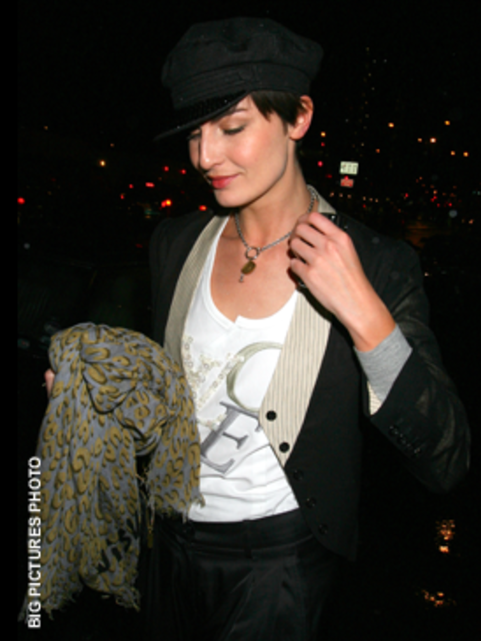<p>Erin's blazer with contrasting lapels is very fabulous. Paired with red lips she has made the A/W trends work with her quirky style</p>