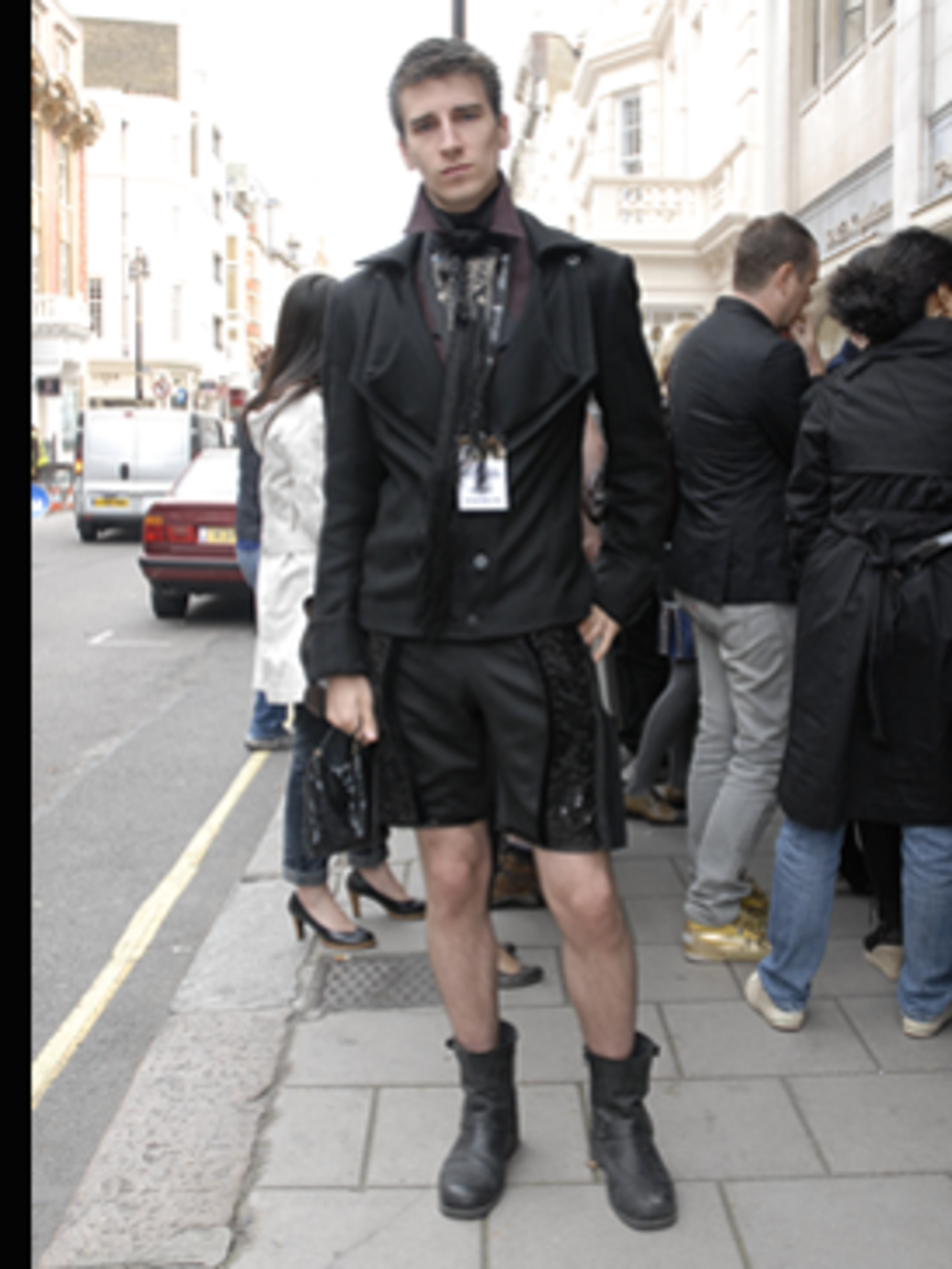 <p>We spotted Matthew, a designer, waiting for the Luella show at Claridges. Not content with any old suit, Matthew's has sequined panels. We love his Chloe inspired biker boots.</p>