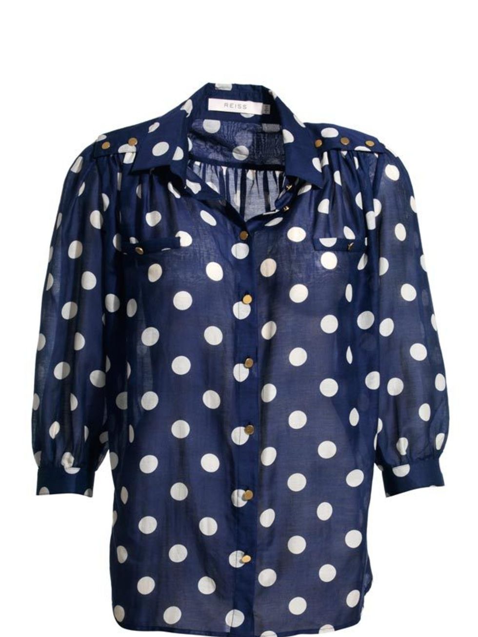 <p>Navy and white spotty blouse, £89, by Reiss (0207 473 9630)</p>