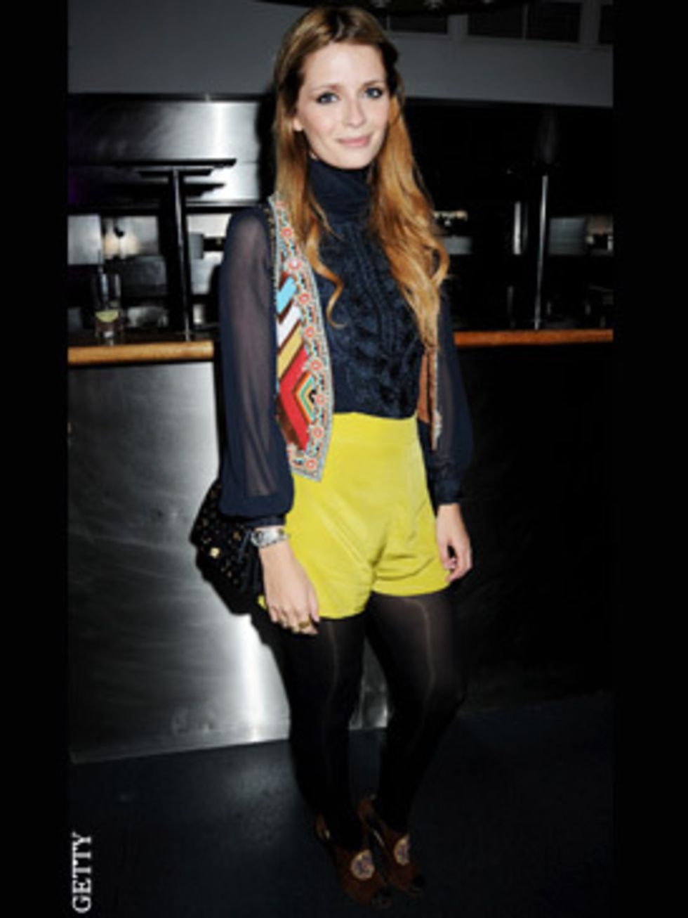 <p>Mischa Barton in an eclectic look for a party at Harvey Nichols hosted by Pharell Williams</p>