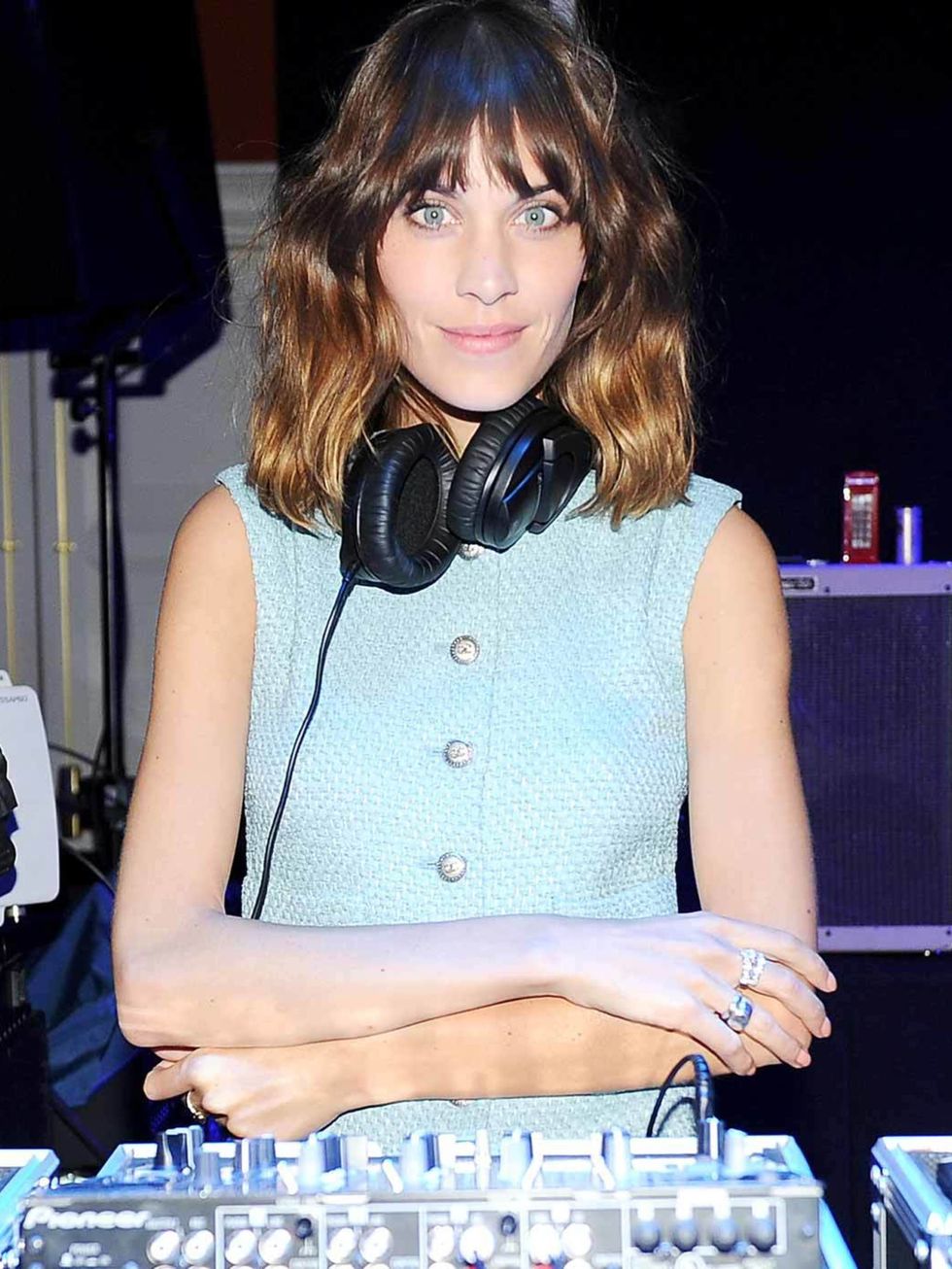 <p>Alexa Chung at the DJ booth for Chanel.</p>