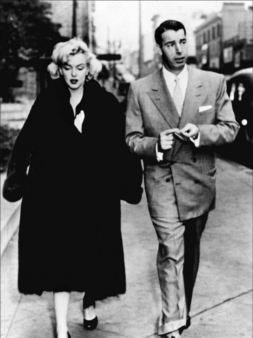 <p>Monroe with her second husband American baseball player Joe DiMaggio in 1954</p>