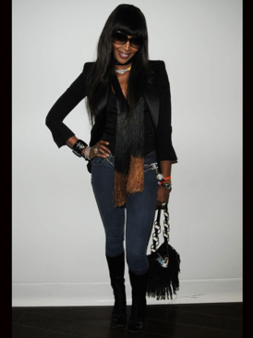 <p>Naomi rocks this year's party season essential - a fitted tuxedo jacket.</p>