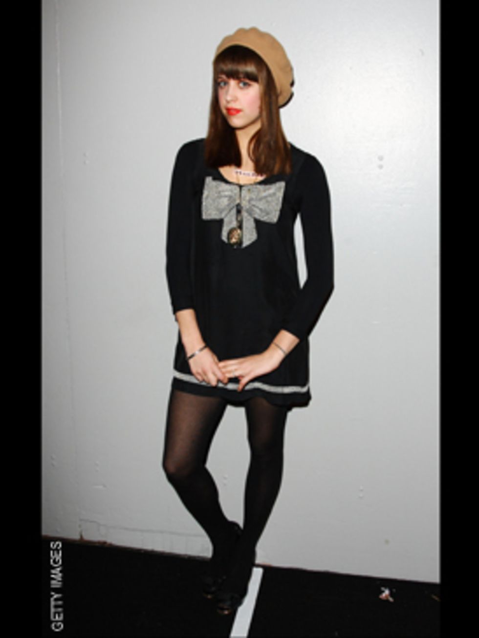 <p>We love the Parisian twist of Peache's sweater dress and beret.</p>