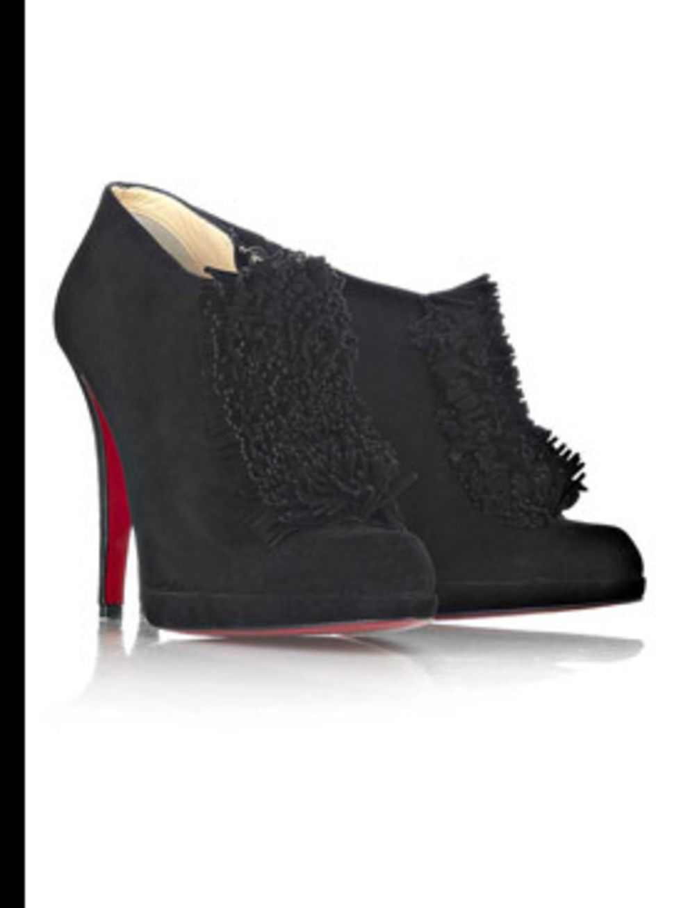<p>Suede tuxedo ruffle ankle boots, £595, by Christian Louboutin at (0207 245 6510)</p>