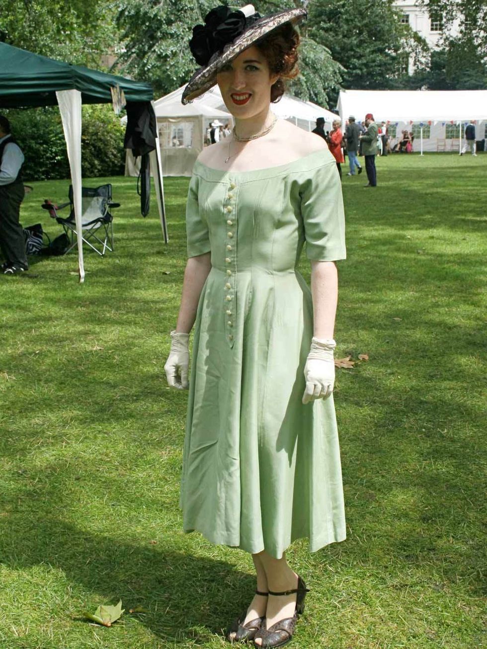 <p>Sadie Doherty, 23, Assistant Milliner.Vintage 1950's dress, Office shoes, 1950's hat, 1960's gloves and necklaces.</p>